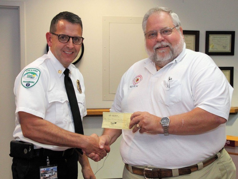 ed presents check to chief full size.jpg